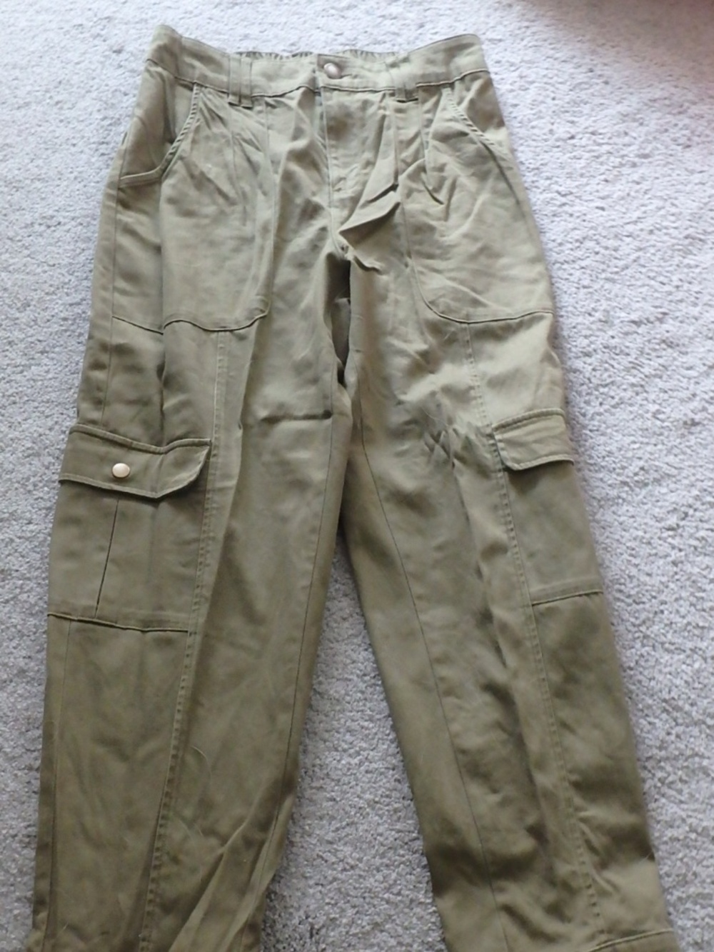 Distressed cargo pants and snap cuff